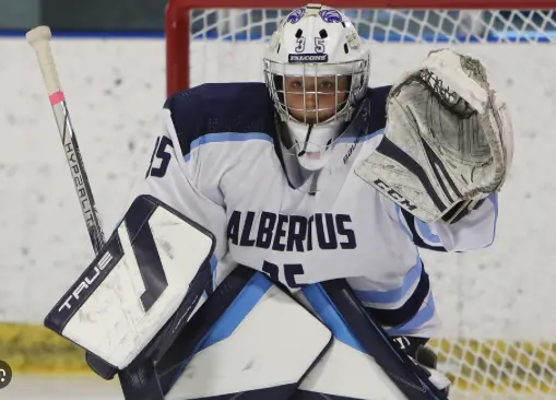 Albertus women's goalie uniform in action
