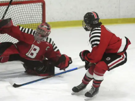 Branford Hornets hockey players wearing red game uniforms