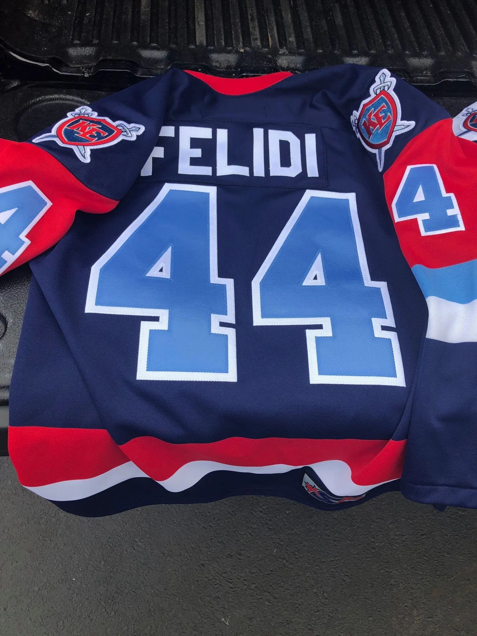 Finished Kent Elite navy hockey jersey back