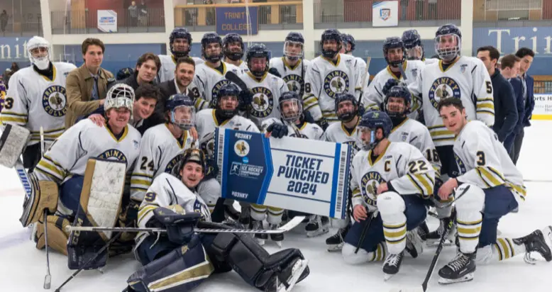 Trinity men's hockey team wearing white game uniforms