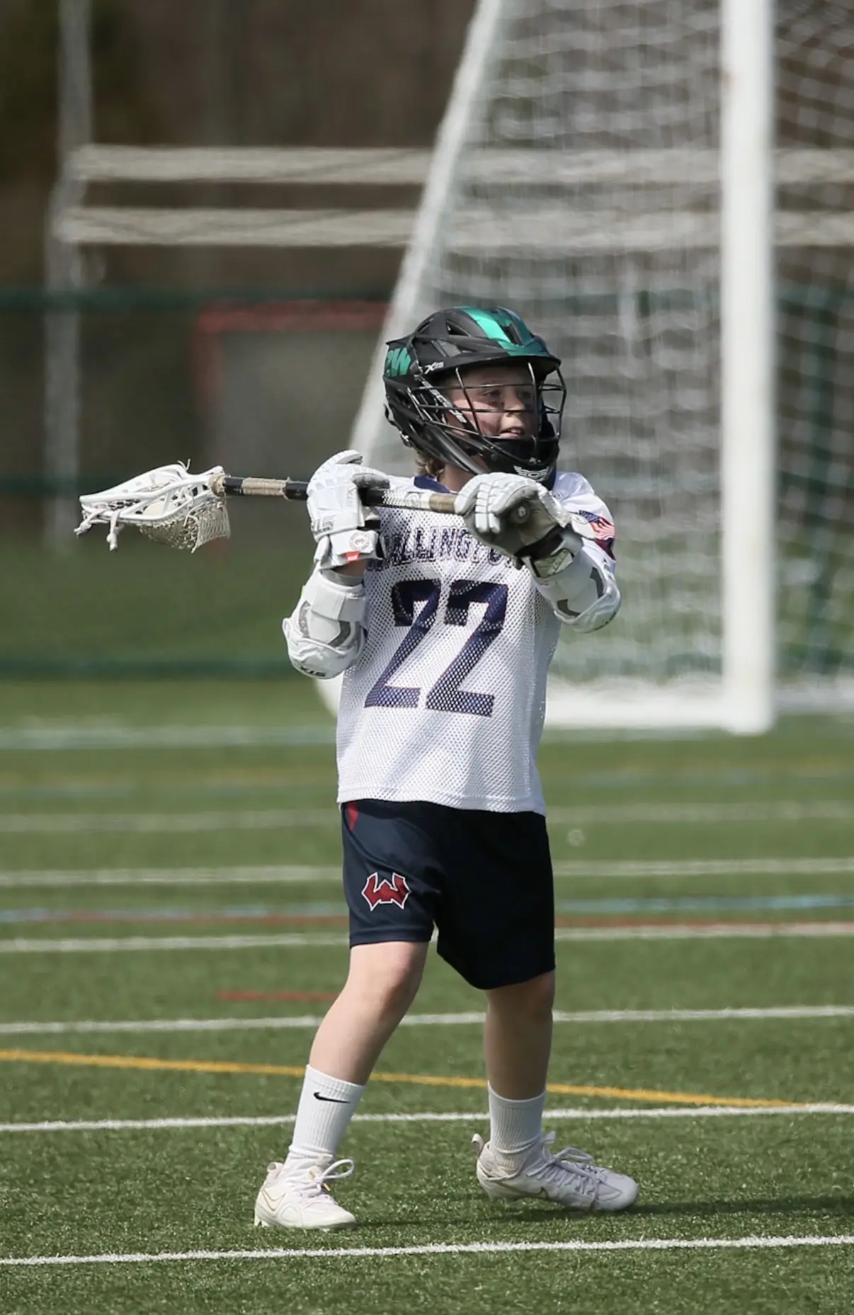 Wallingford lacrosse player throwing the ball